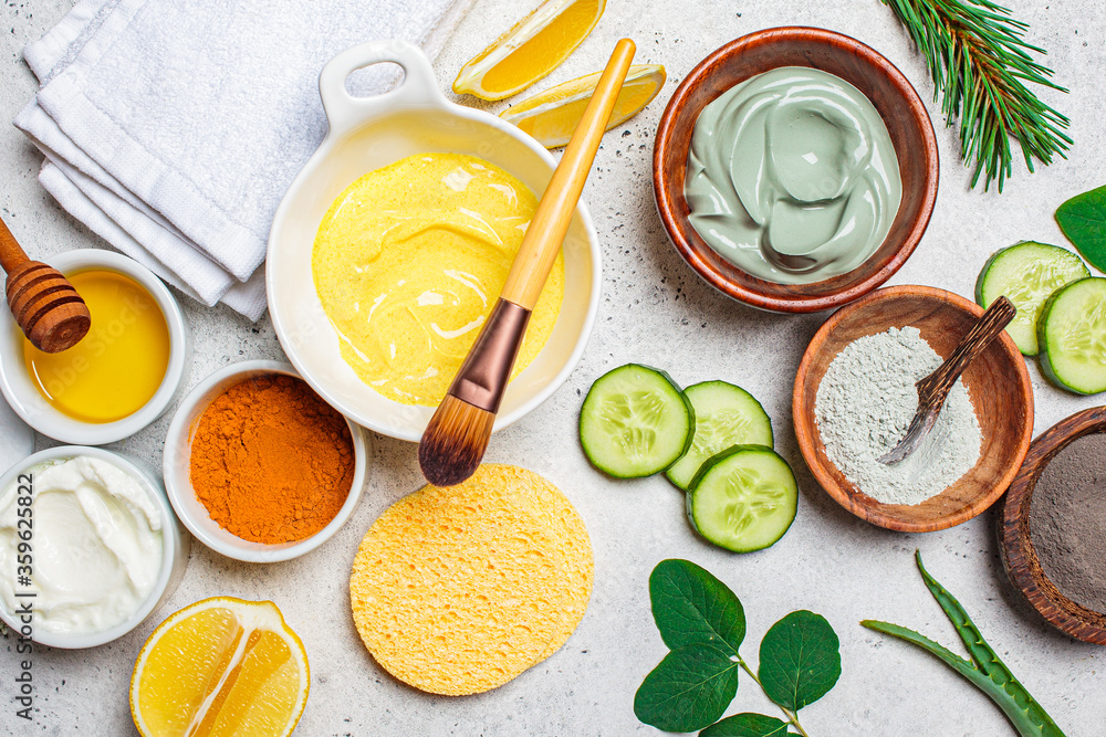 Flat lay of different masks for healthy skin. Natural ingredients and accessories for facial skin care. Skincare concept. Flat lay of different masks for healthy skin. Natural ingredients and accessories for facial skin care. Skincare concept.