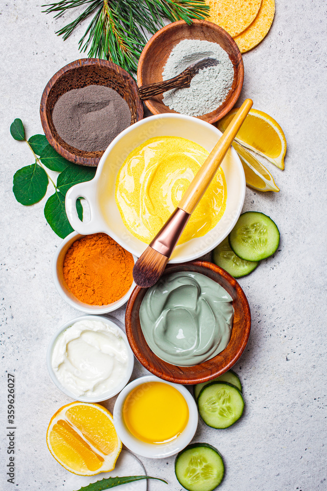 Flat lay of different masks for healthy skin. Natural ingredients and accessories for facial skin care. Skincare concept. Flat lay of different masks for healthy skin. Natural ingredients and accessories for facial skin care. Skincare concept.