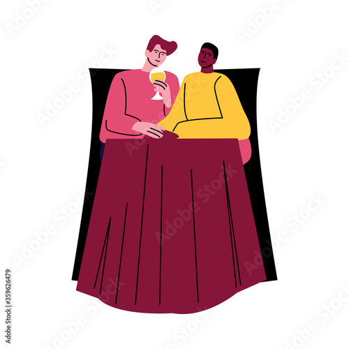 A happy gay couple of men in casual clothes sitting at the table in chairs. Vector illustration in cartoon style.