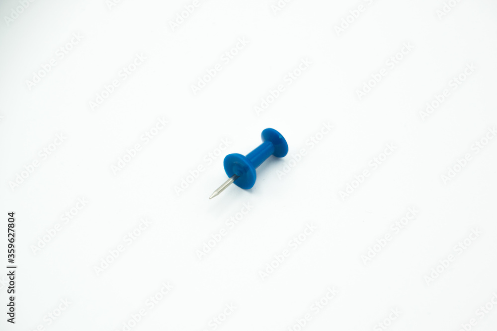 isolated blue pushpin in a white background isolated blue pushpin in a white background