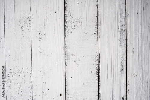 Background of boards, texture of old wood painted white, space for text or images.