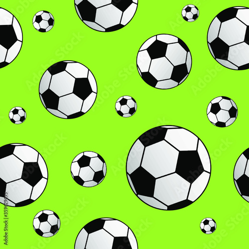 soccer ball on green background © selim