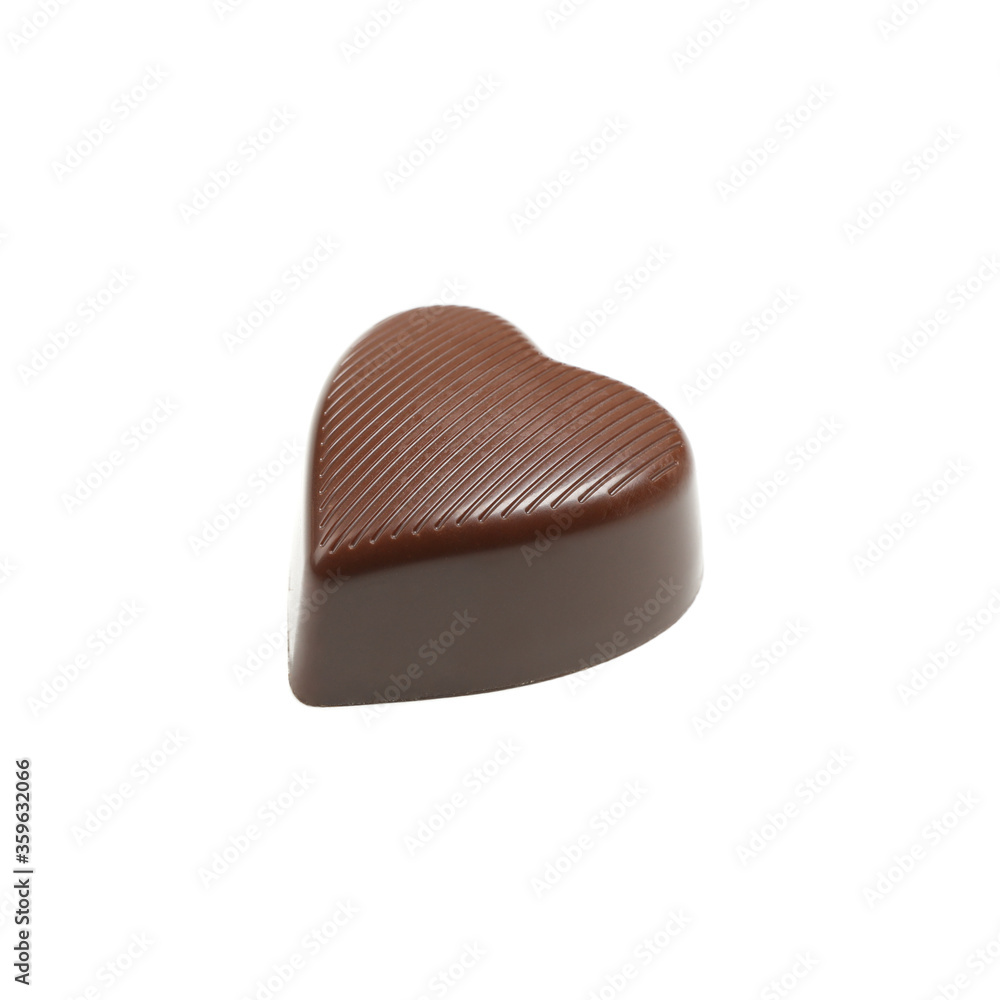 Tasty chocolate candy in the heart form isolated on white background Tasty chocolate candy in the heart form isolated on white background