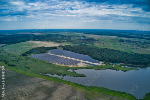 Aerial view of a large solar station. Green energy of the sun.