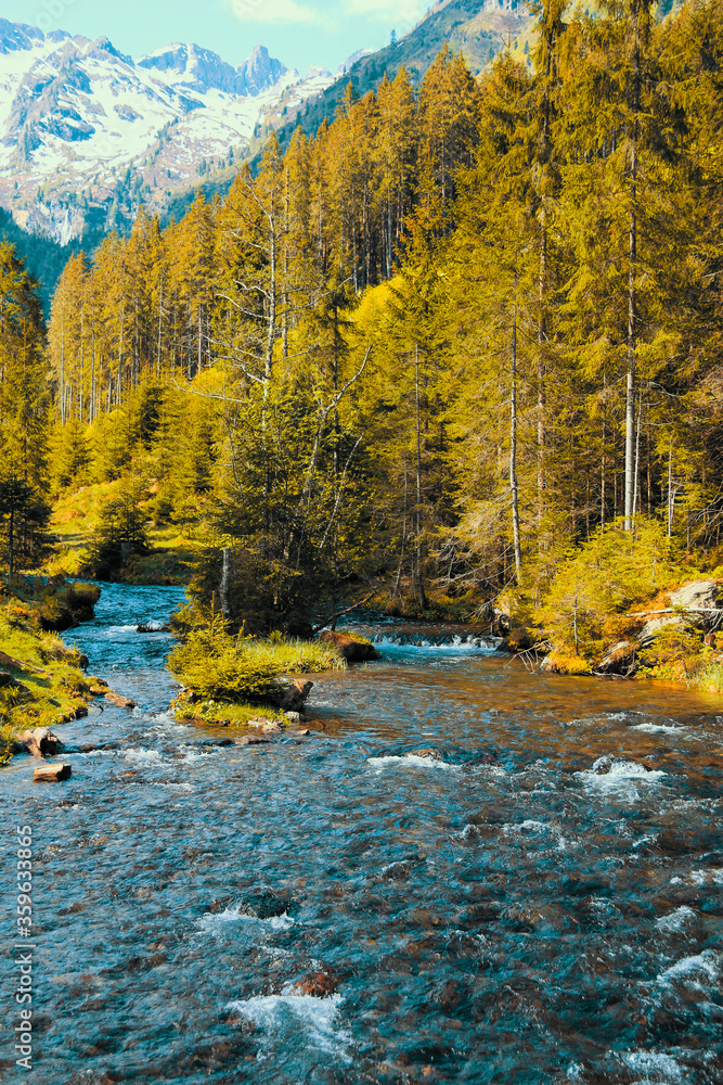 Small pure creek rushing downhill the Schladminger Tauern mountains near the 
