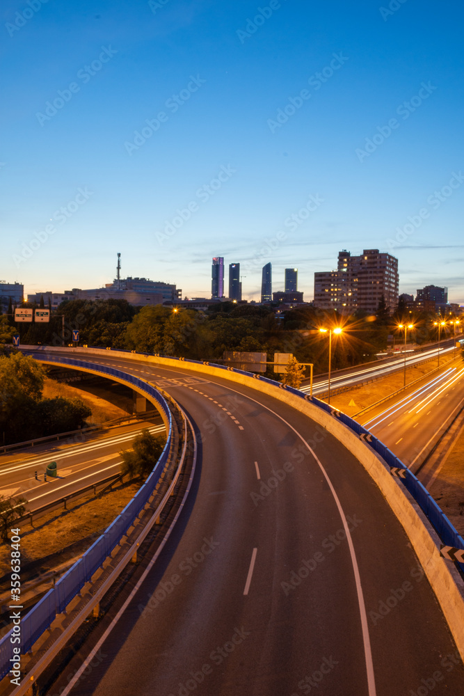 View of the M30 motorway bridge, without cars, at sunset in Madrid, Spain, vertically