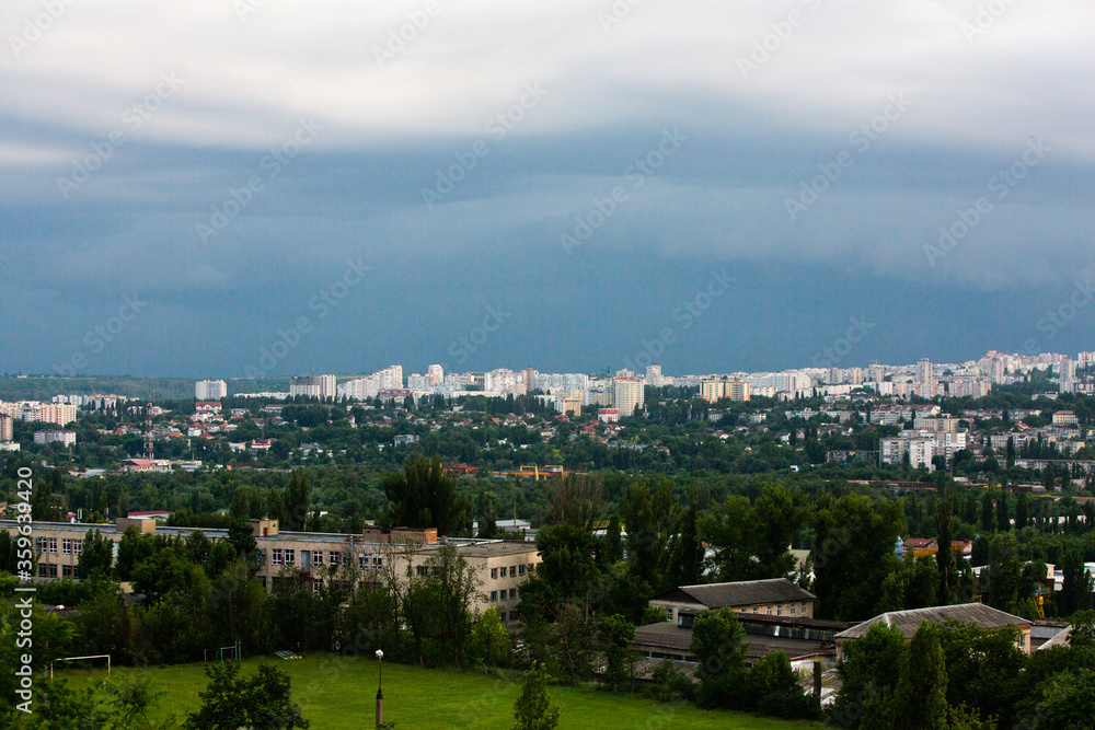 Chisinau, the capital city of the Republic of Moldova. Storm clouds over city. Cloud over the city at the sunset.