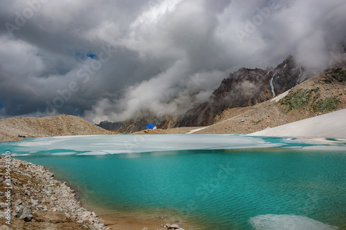 Wonderful mountain landscape with turquoise lake, reflection, peaks . Picturesque view near Adygine lake.