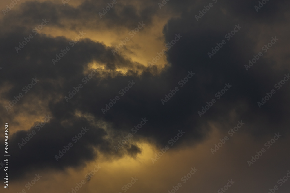 Thunderclouds on a gray sky. Beautiful background Thunderclouds on a gray sky. Beautiful background