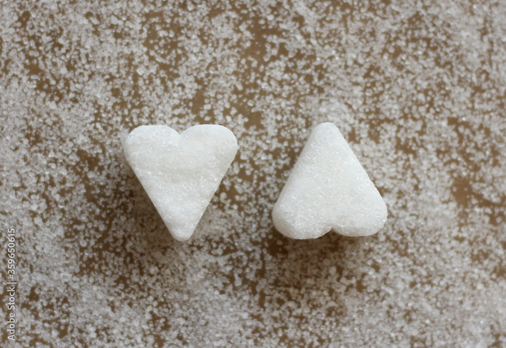 Obraz premium Sugar cubes in a heart shape 