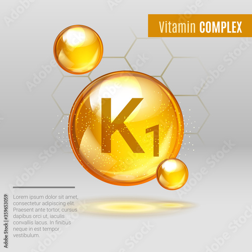 Vitamin K1 gold shining pill capsule icon . Vitamin complex with Chemical formula, Phylloquinone, menaquinones. Shining golden substance drop. Meds for heath ads. Vector illustration.