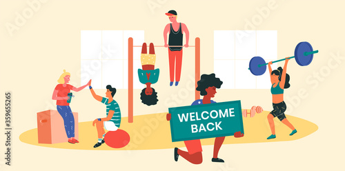 Sportsman with Welcome back banner, informing local workout community about the resumption of trainings. People working out together at park or playground doing functional exercises, yoga, stretching.