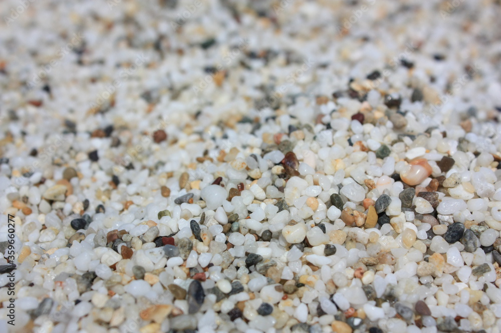 black and white sand on the beach