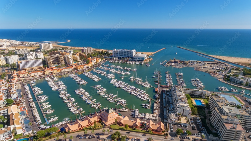 Aerial photo of the bay, Vilamoura, Quarteira, Portugal. Marina with luxury yachts.