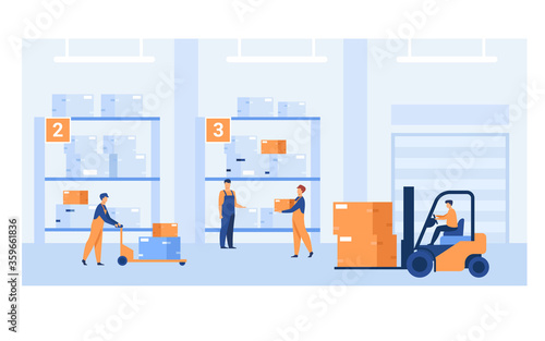 Fototapeta Logistic workers carrying boxes with loaders in warehouse