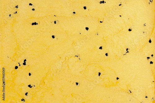 close up vanilla ice cream with chocolate chips scratching texture