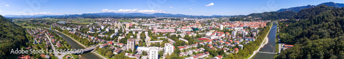 Spectaculat cityscape panorama of a city with river flowing by. © anzebizjan