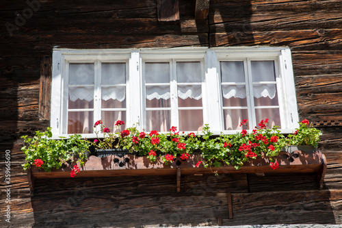 Canza (VCO), Italy - June 21, 2020: A window at Canza village, Formazza Valley, Ossola Valley, VCO, Piedmont, Italy