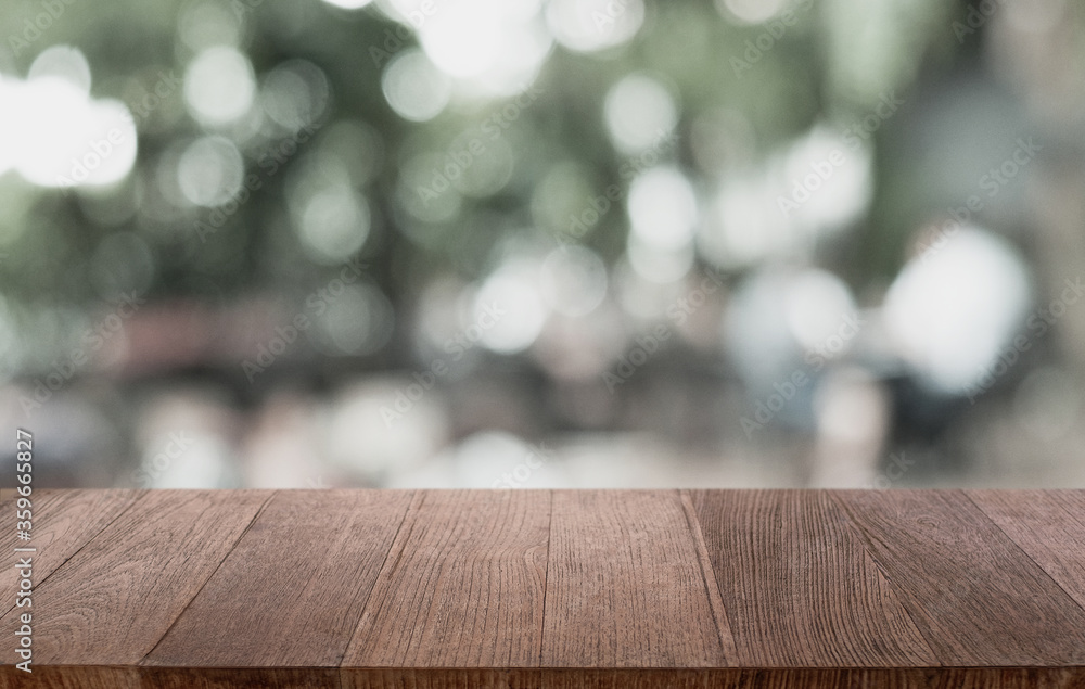 Wood Table Top in Blur Background room interior with empty copy space. Wood Table Top in Blur Background room interior with empty copy space.