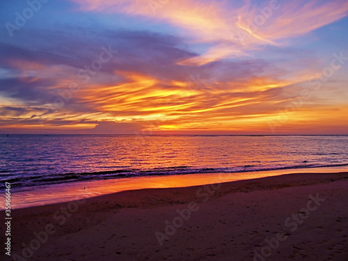 Fototapeta Naklejka Na Ścianę i Meble -  beach sunset at evening time with twilight cloudy sky