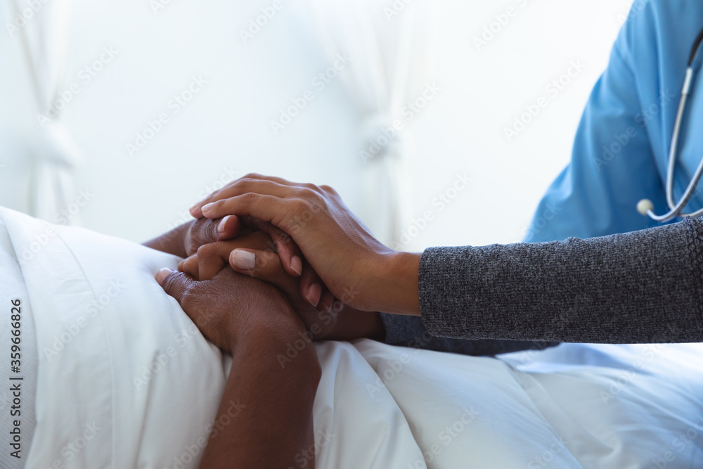 Sick Senior African American woman at home during quarantine lock down for coronavirus covid19 Sick Senior African American woman at home during quarantine lock down for coronavirus covid19