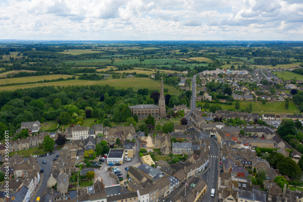 Cotswold village and landscape from drone