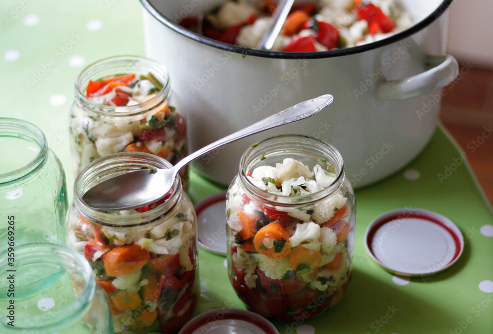 Pickle for winter in jars on the table Pickle for winter in jars on the table