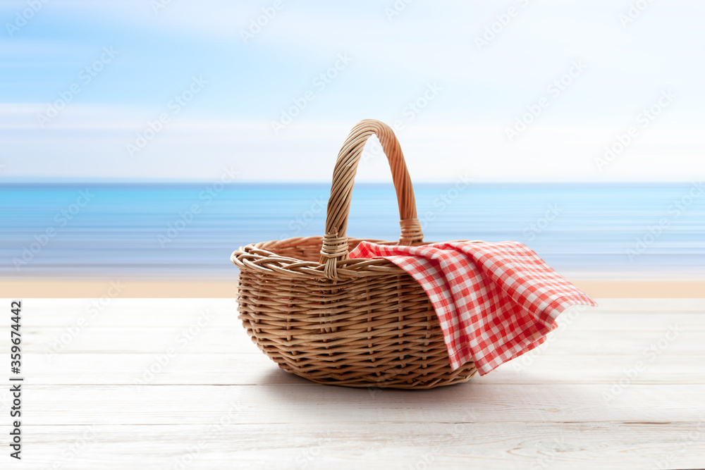 empty basket with red napkin picnic on table place
