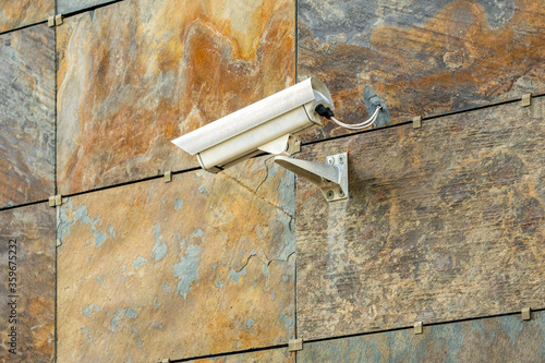 Surveillance camera mounted on the wall