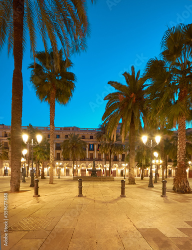 Barcelona at night, illuminated Plaza Real in in Gothic quarter of Barcelona, Catalonia, Spain. Barcelona at night or early in the morning
