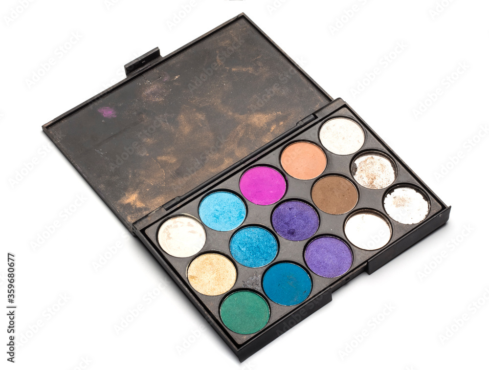 Top view, old used eye shadow on a white background Top view, old used eye shadow on a white background