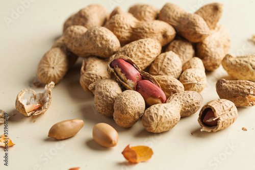 Wallpaper Mural Handful of peanuts in shells, roasted nuts, roasted nuts. The concept of a healthy diet, a snack for vegetarians. Torontodigital.ca