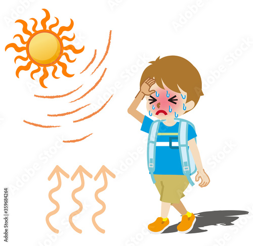 熱中症に苦しむ男の子