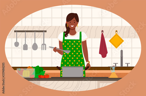 Woman cooking healthy food in kitchen. Smiling person in apron boiling soup or making vegetarian salad with tomato and bell pepper. Happy female standing near stove, cutlery and towel on wall vector