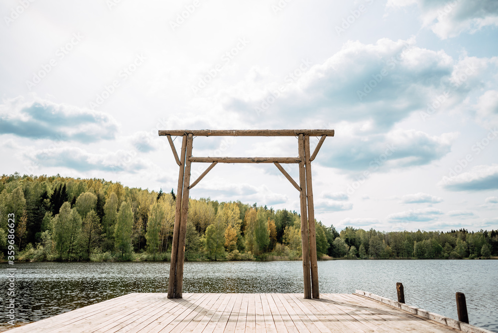 Wooden pier on lake or river shore