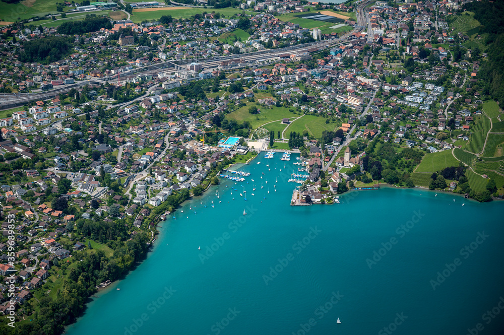 aerial view of the Bay of Spiez, Lake Thun and a course ship