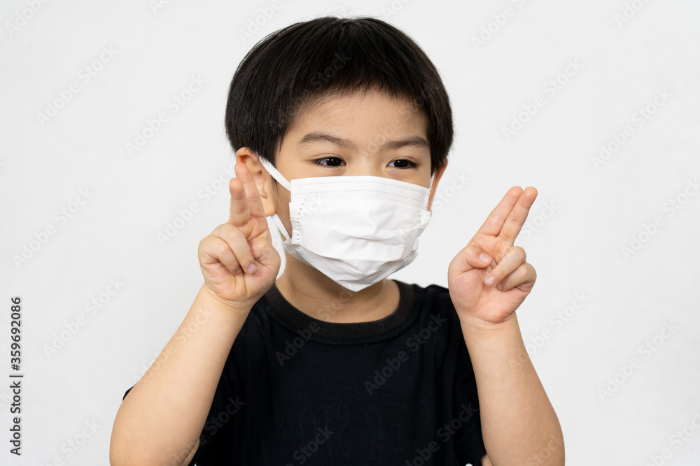 Asian boy waring mask for protect corona virus. Asian boy waring mask for protect corona virus.