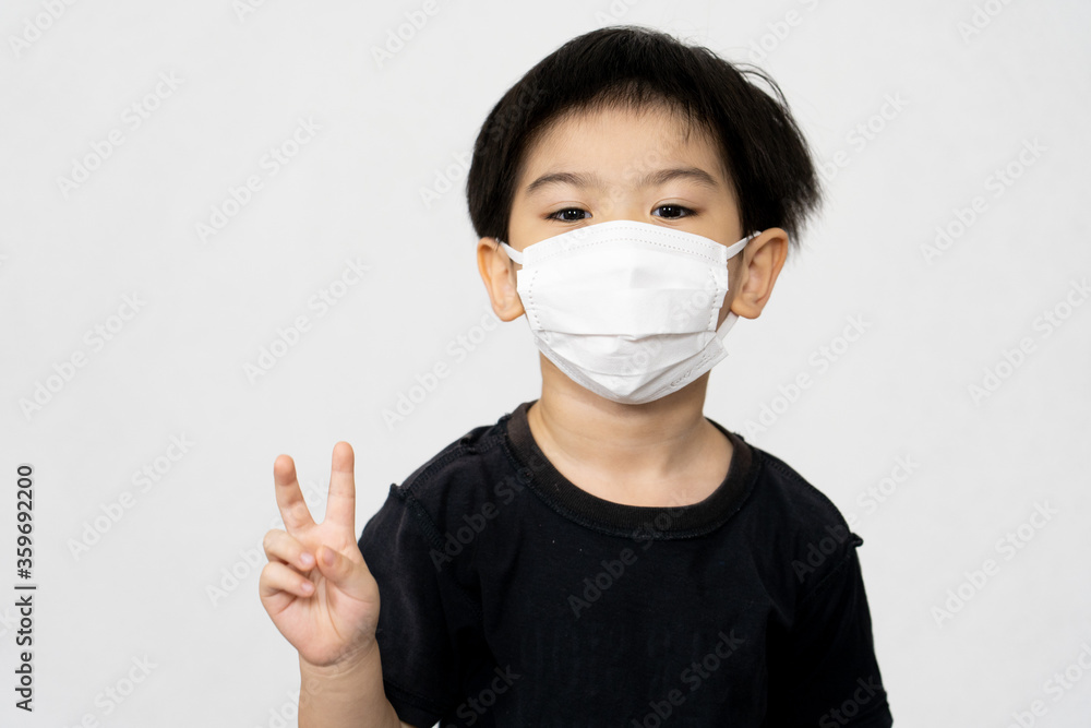 Asian boy waring mask for protect corona virus. Asian boy waring mask for protect corona virus.