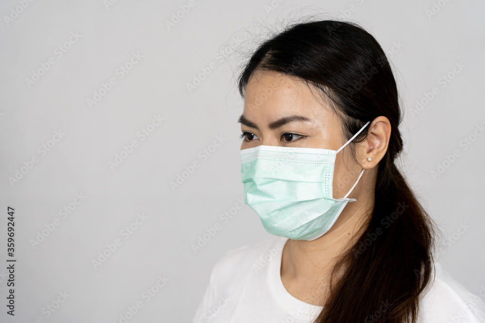 portrait woman waring mask for protect corona virus on white background. portrait woman waring mask for protect corona virus on white background.