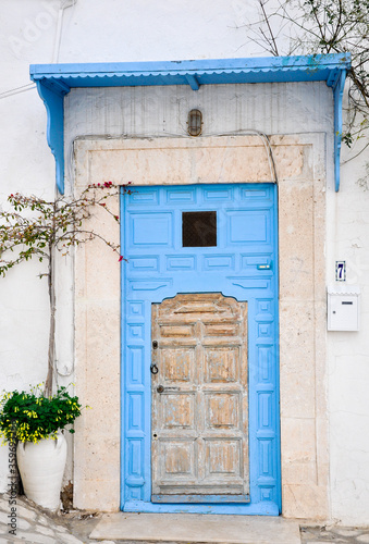 Traditional old painted door in Sidi Bou Said, Tunisia. © erdalakan