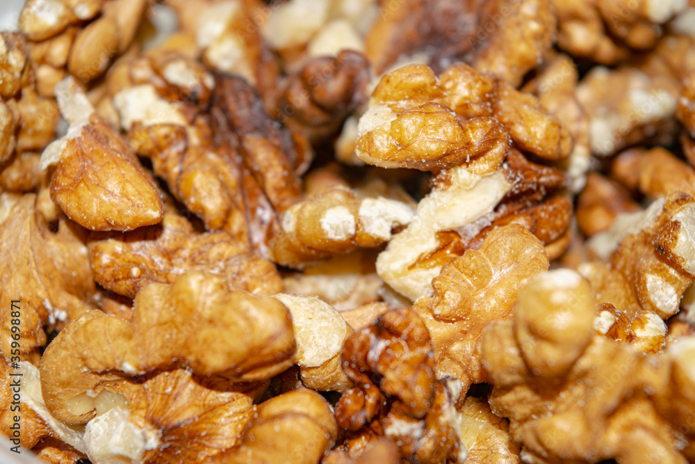 Peeled walnuts close-up. Surface texture. Healthy diet.