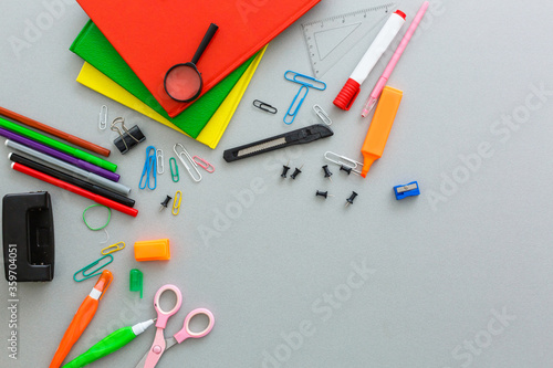 Material for school, paper clips, pencils, colors, scisor and notebook