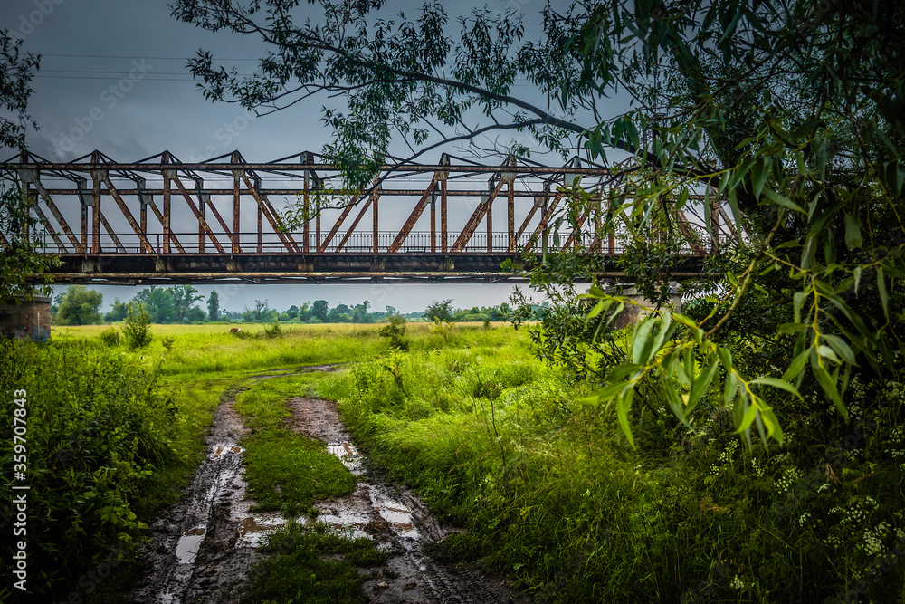 Mud on a dirt road under the bridge. Mud on a dirt road under the bridge.