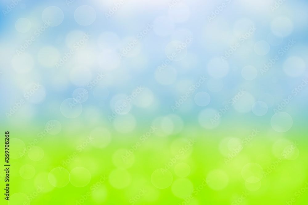Spring or summer abstract nature background with fresh grass on blue sky backdrop with copy space. Easter concept. Spring or summer abstract nature background with fresh grass on blue sky backdrop with copy space. Easter concept.