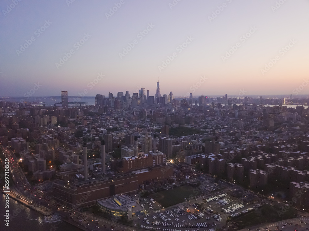 Wide Aerial Drone View of Manhattan Skyline in New York City at Dusk 