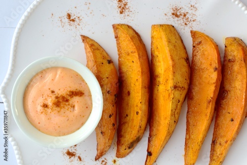 Sweet potato fries with mayonnaise and ketchup