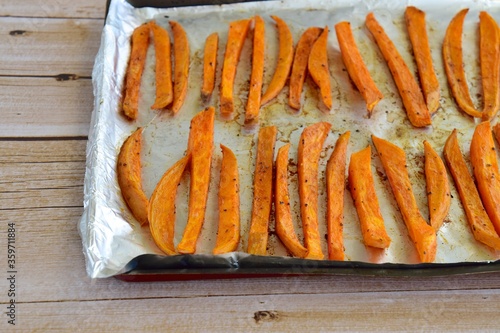 Sweet potato fries on baking sheet