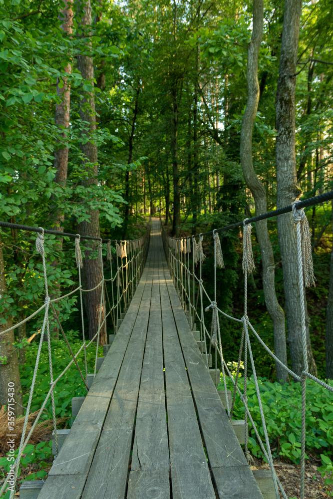 Obraz premium Suspension bridge, walkway to the adventurous, cross to the other side.