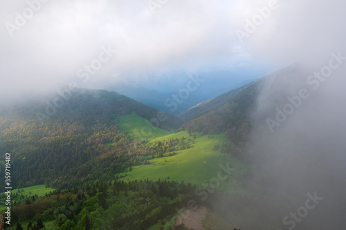 Majestic view on beautiful fog mountains in mist landscape. Dramatic unusual scene. Travel background. Exploring beauty world. little fatra mountains. Slovakia Europe.