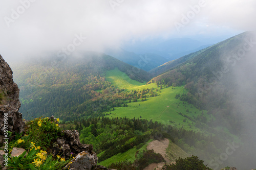Majestic view on beautiful fog mountains in mist landscape. Dramatic unusual scene. Travel background. Exploring beauty world. little fatra mountains. Slovakia Europe. © Martin